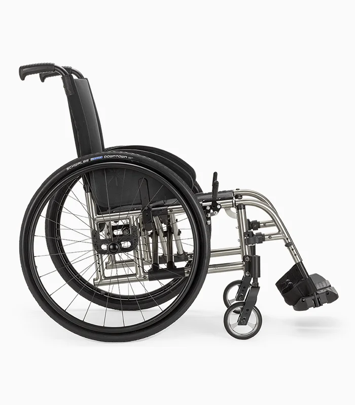 Ki Mobility Catalyst wheelchair with titanium frame, side view.