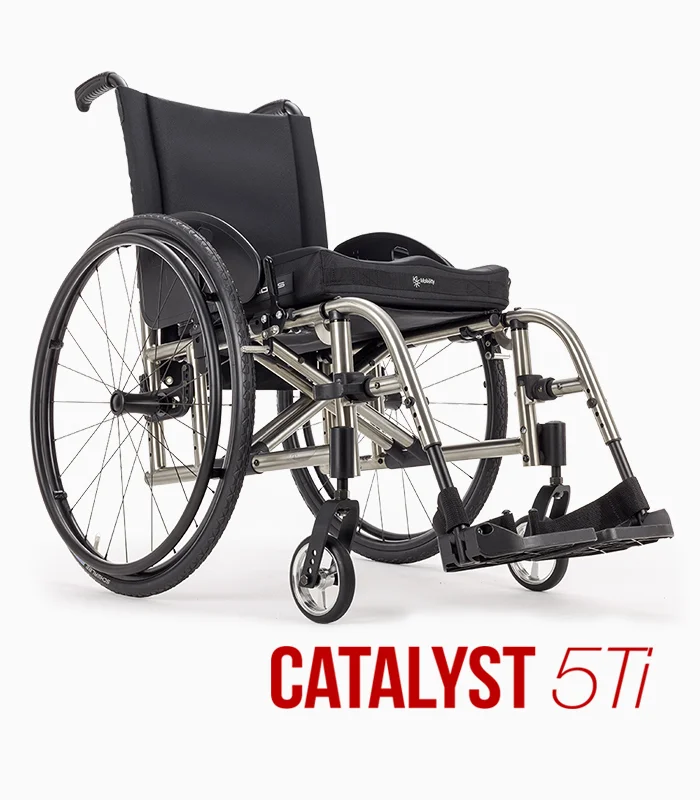 Ki Mobility Catalyst 5Ti wheelchair with titanium frame, angled view.