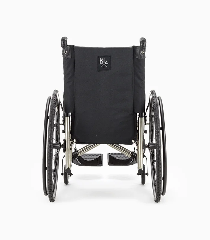 Ki Mobility Catalyst wheelchair with titanium frame, rear view.