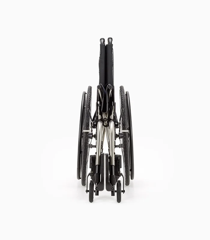 Ki Mobility Catalyst wheelchair with titanium frame, folded, front view.