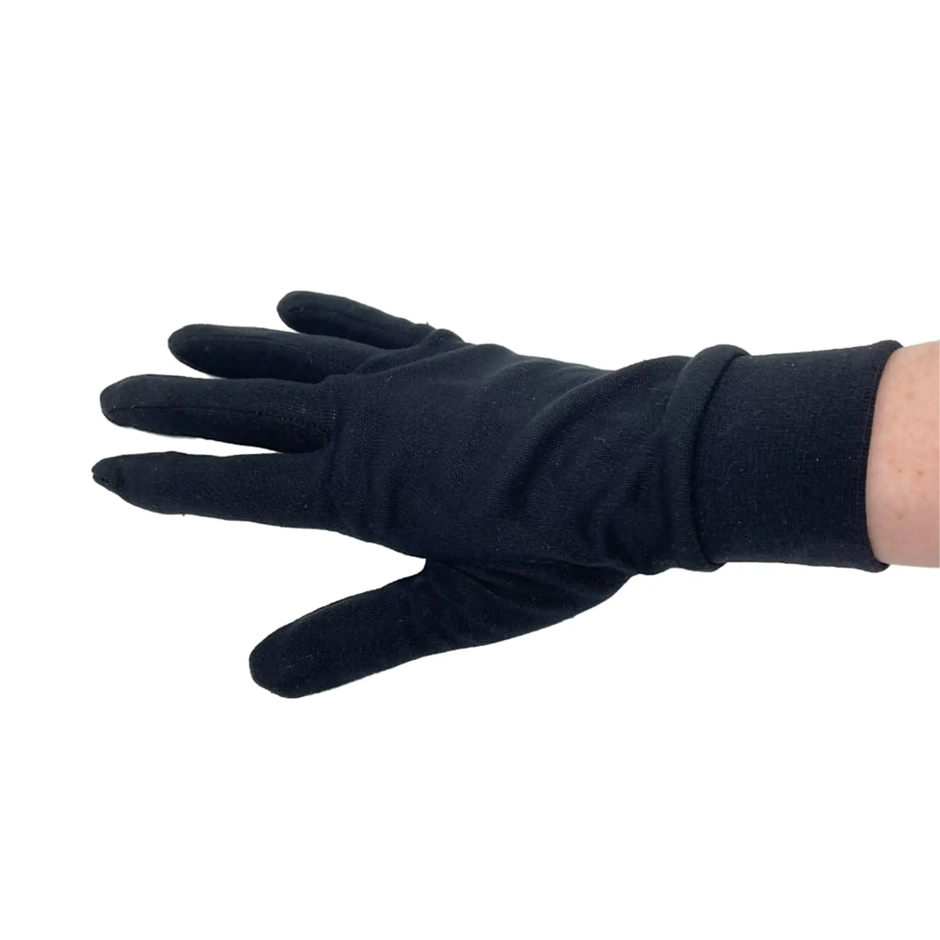 Back view of a hand wearing a black silk glove liner with a slightly bunched cuff.