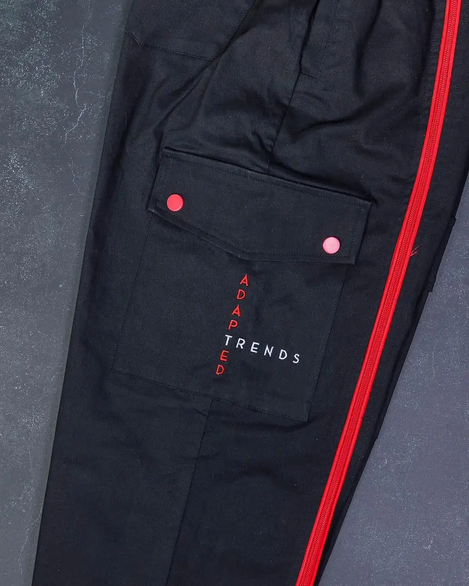 Logo and Fabric Detail on Black Cotton Adapted Cargo Trousers