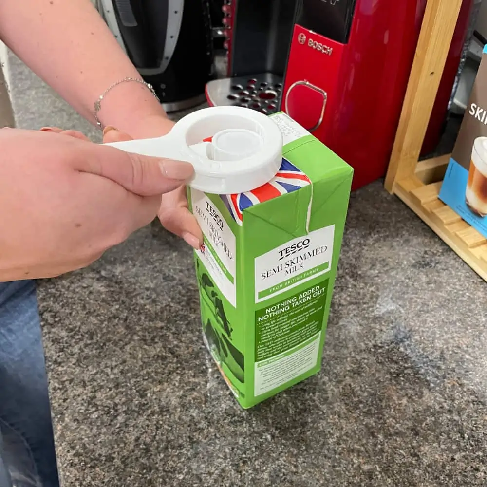 Opening Juice Carton With The Active Hand Cap Off