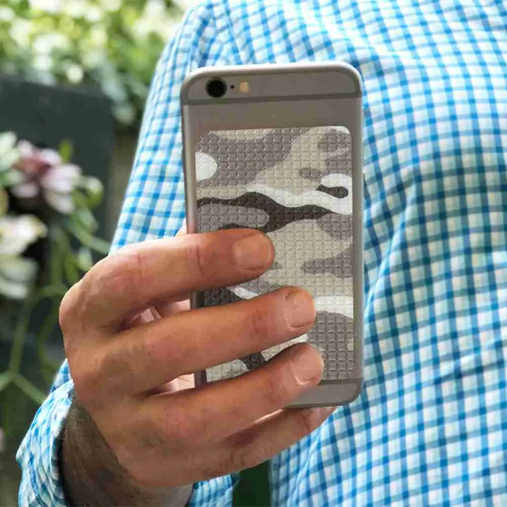 Adult Using The Cat Tongue Phone Laptop Grips