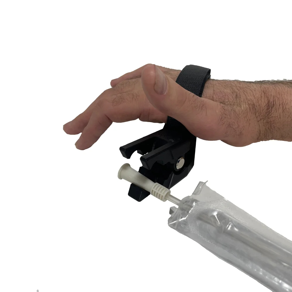Close Up Of Adult Holding Easypee-sy Catheter Tool's hand Strap