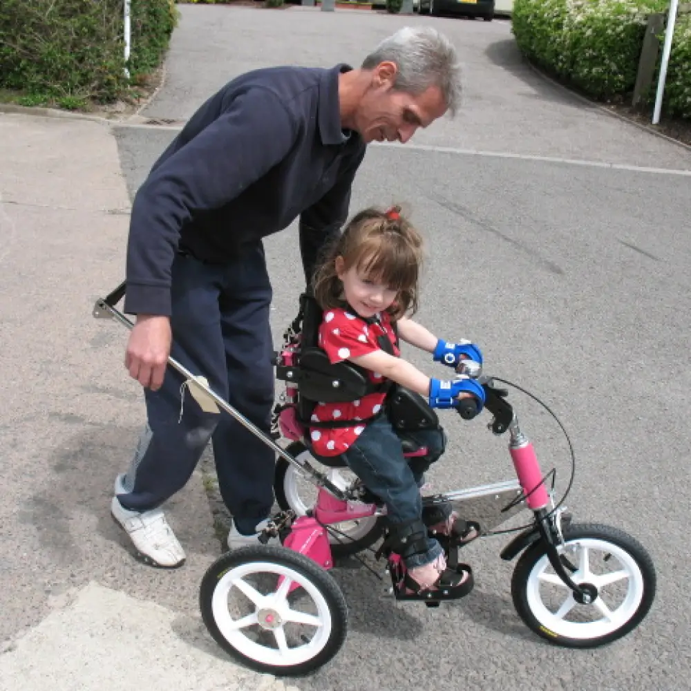 Child Riding Bike Using The General Purpose Mini Aid