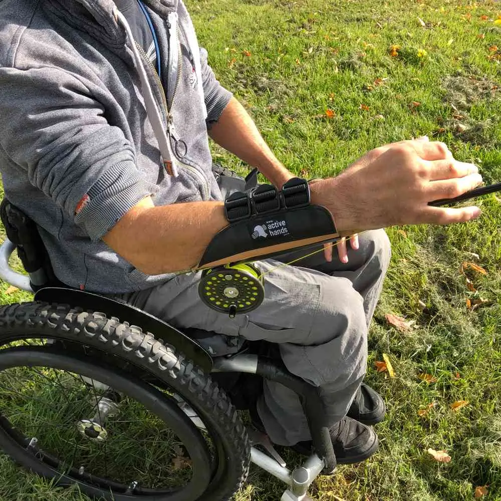 Adult Wearing The Strong Arm 2 Fishing Aid
