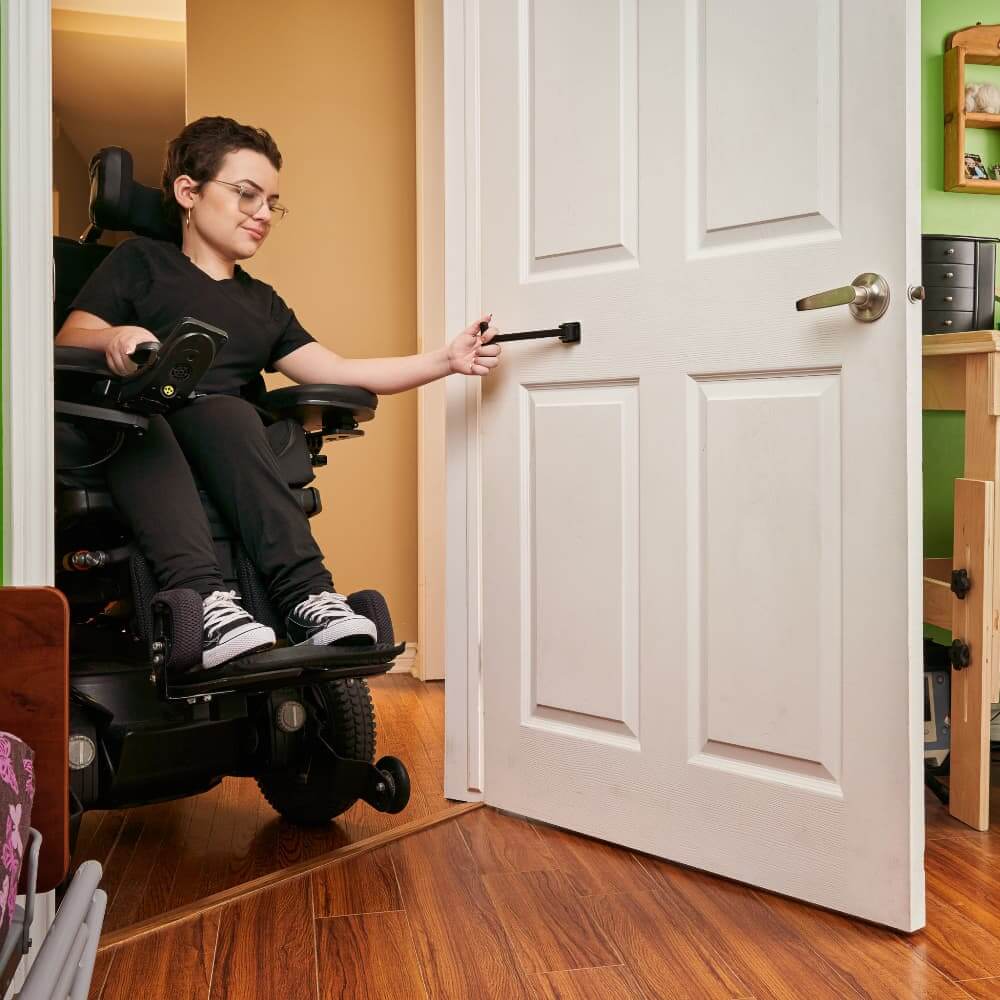 Adult Pulling The T-Pull Door Closer