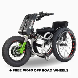 Triride T-Rocks handbike attachment with dual battery packs and fat off-road front tire, connected to a manual wheelchair, with text reading "+ FREE VIGEO OFF ROAD WHEELS."