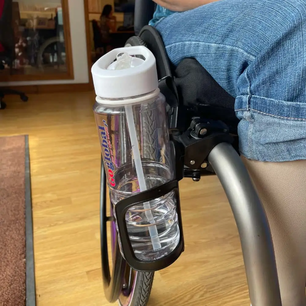 Wheelchair Drinks Holder With An Water Bottle