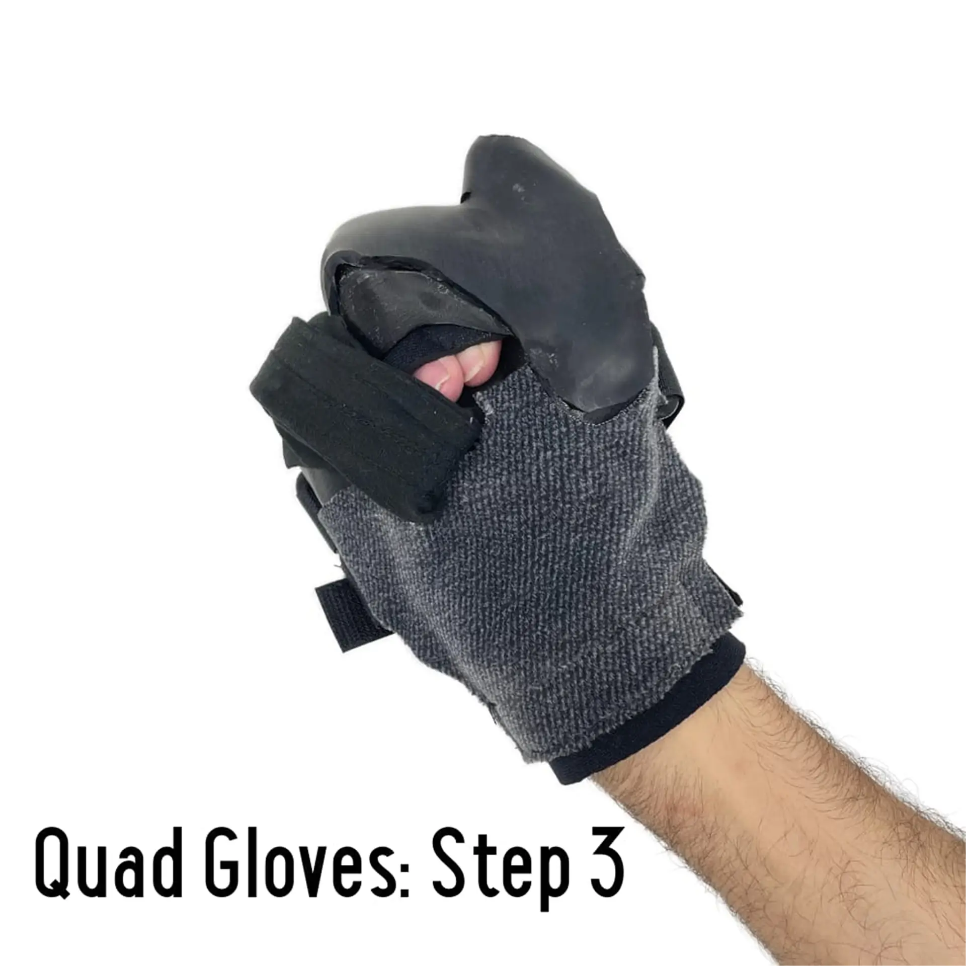 Closed fist wearing a fully secured Quad Glove, labeled Step 3.