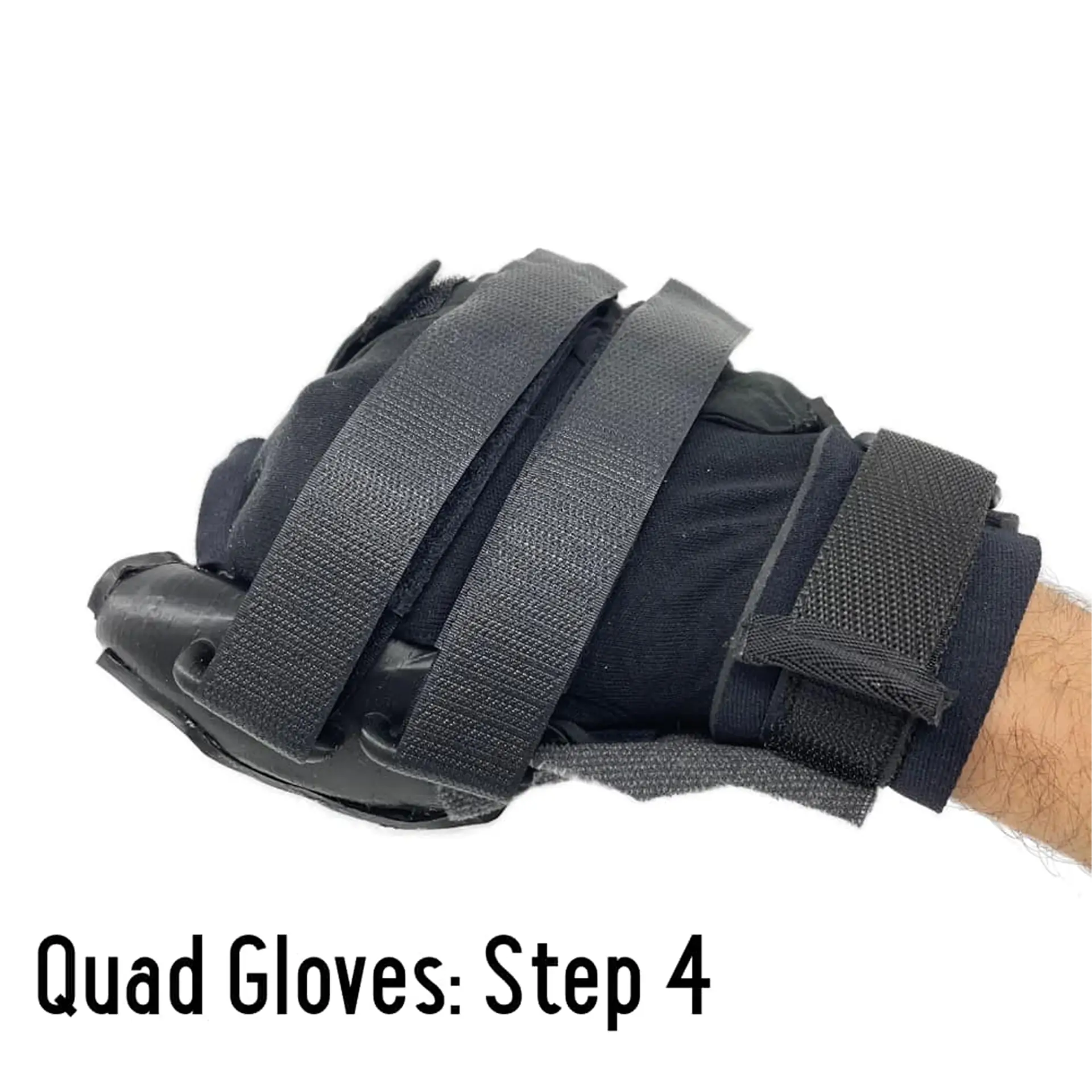Side view of a fastened Quad Glove on a fist with straps wrapped around, labeled Step 4.