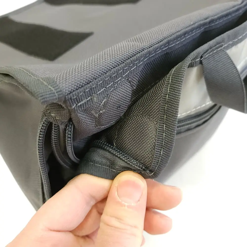 Adult Opening The Wheelchair Under Seat Bag