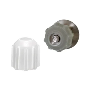 White ribbed door knob cover next to a metal door knob.