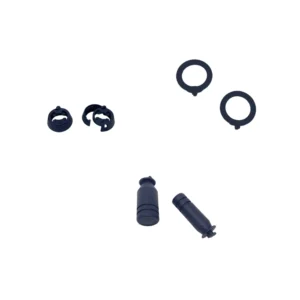 Assorted controller grip parts: rings, caps, and stick extenders.
