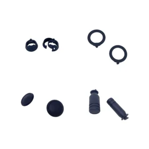 Assorted controller grip parts: rings, caps, and stick extenders.