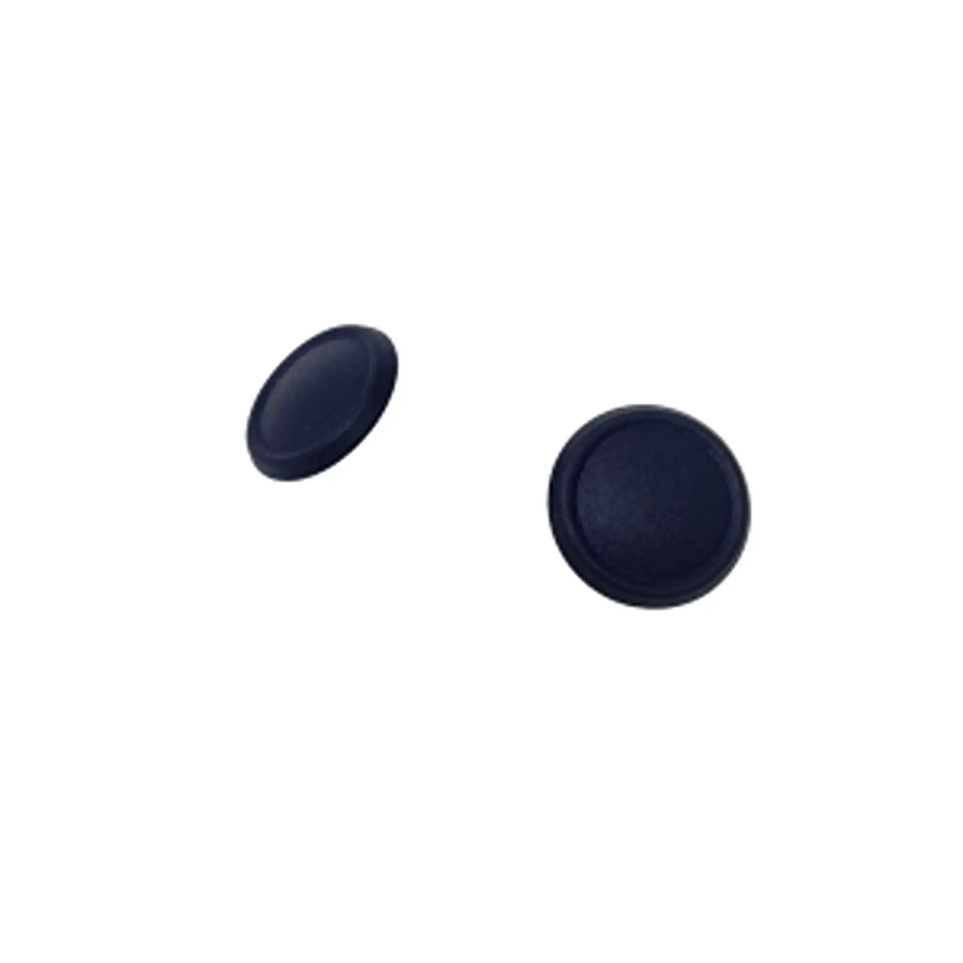 Two small round rubber thumbstick caps.