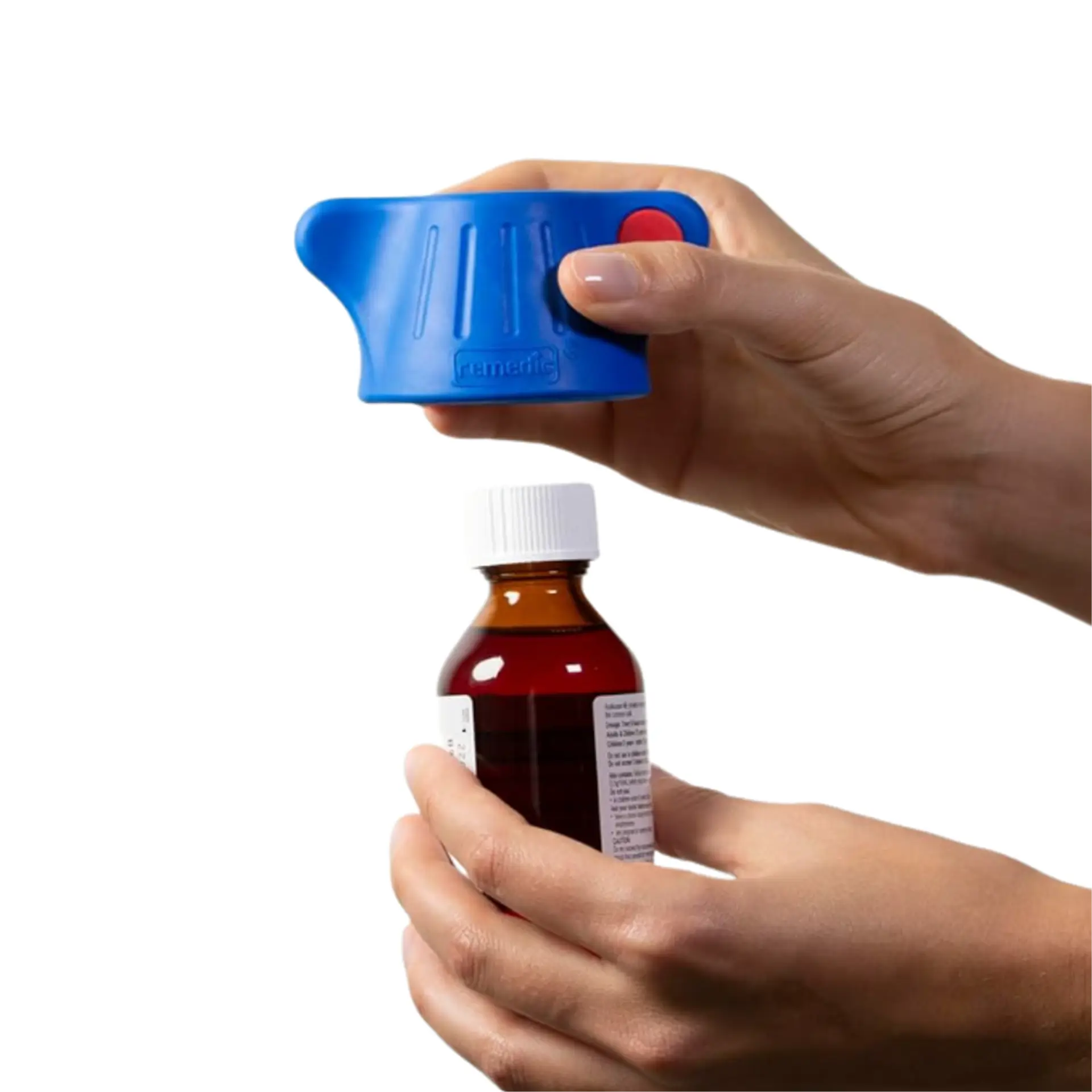 Hands using blue bottle opener on medicine bottle.