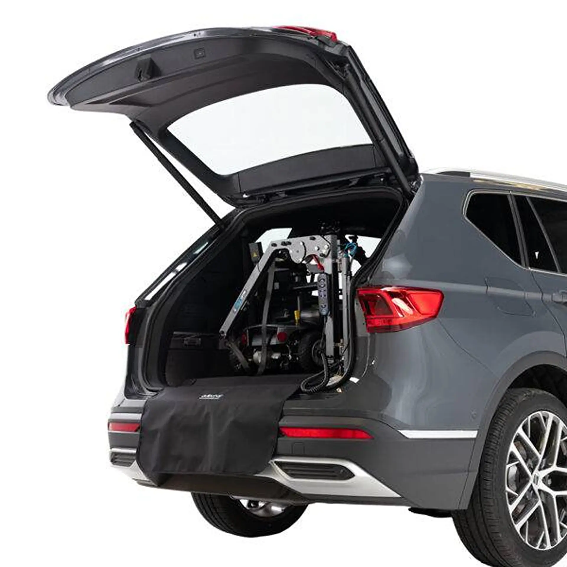 SUV boot with the folded lifter arm partly covered by a protective liner.