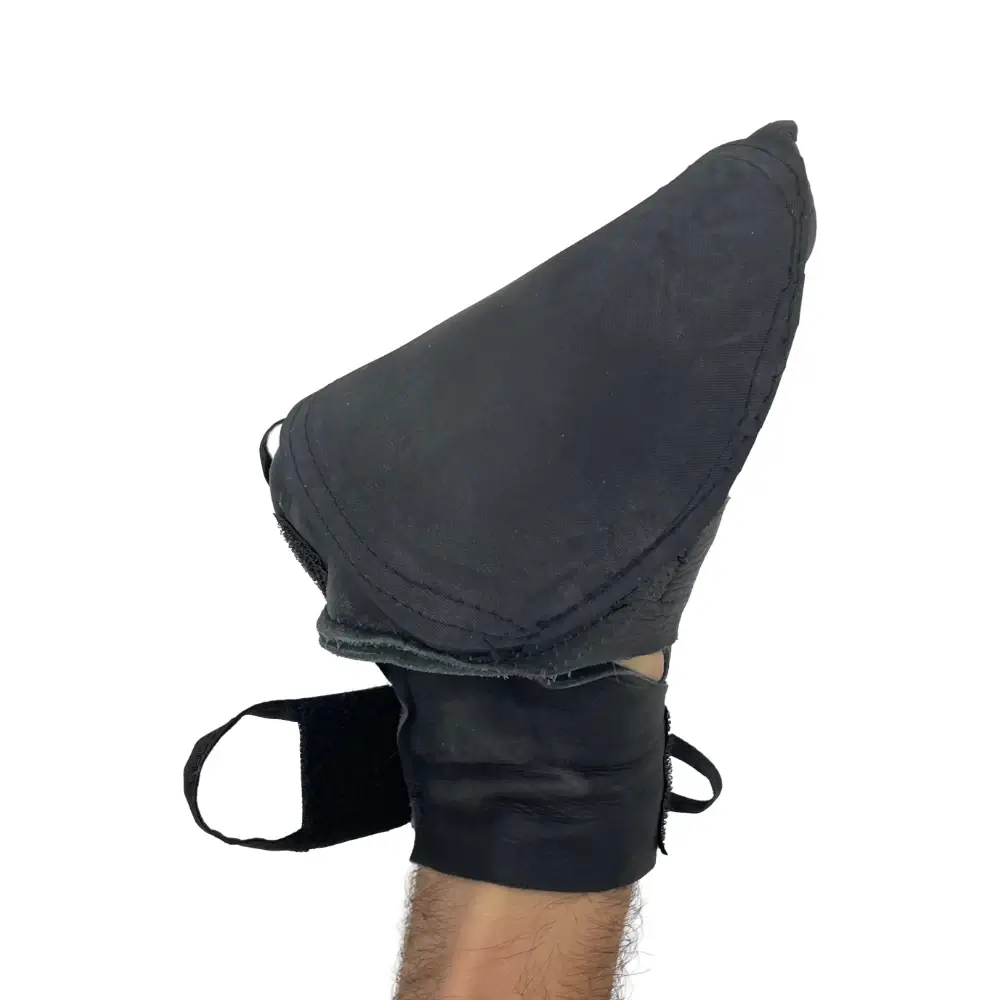 Black wheelchair racing glove on forearm, side view