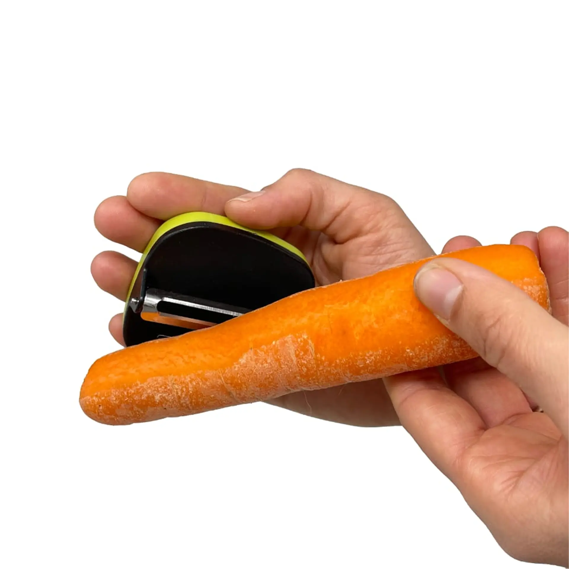 Hand peeling carrot with round palm peeler.