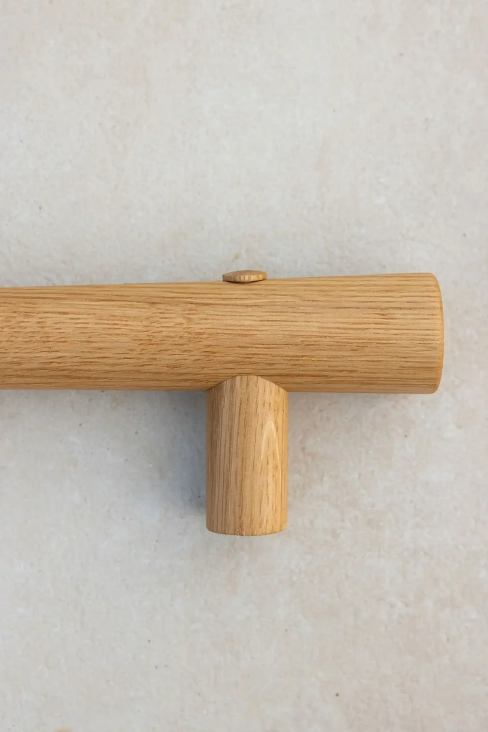 Close-up of the T-joint detail on an oak grab rail.